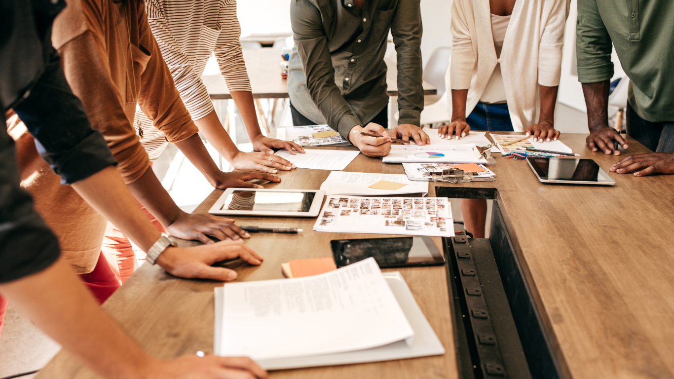Business professionals in a meeting with their IT service management company
