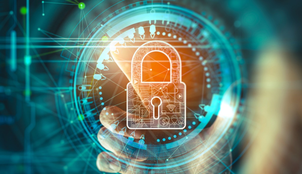 Businesswoman tapping a virtual image of a lock.