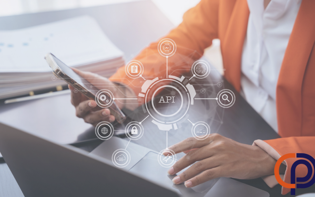 Woman using a laptop, tablet, and smartphone, with a virtual screen displaying an API icon.