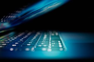 Angled view of a laptop keyboard.  