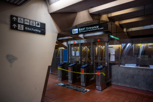 Caution tape blocks the fare gate to BART on September 5, 2025.